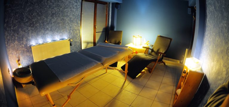 Panoramic view of the nice massage room in spa saloon